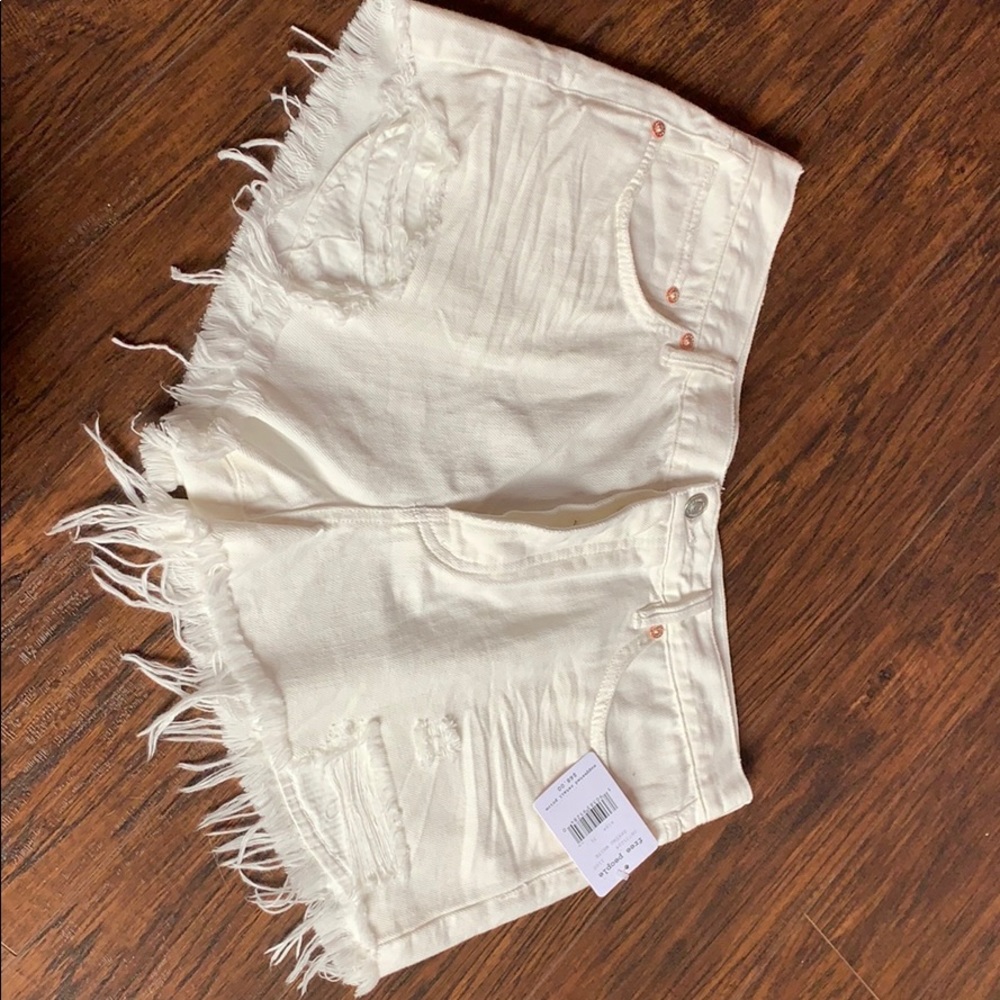 NWT FREE PEOPLE distressed white denim jean shorts